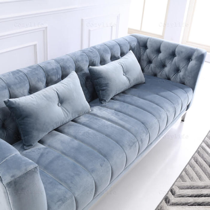 light blue tufted sofa detail