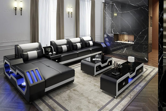 black sectional couch with console unit