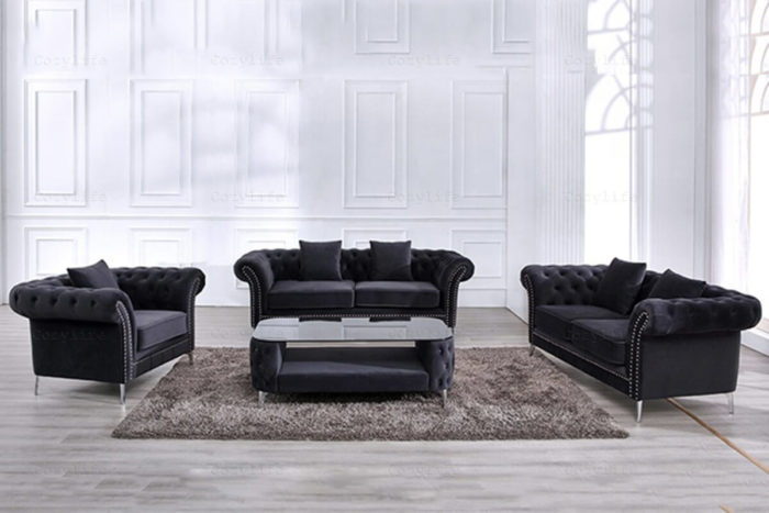 black tufted sofa set with chesterfield tables